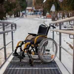 Wheelchair on a wheelchair ramp.