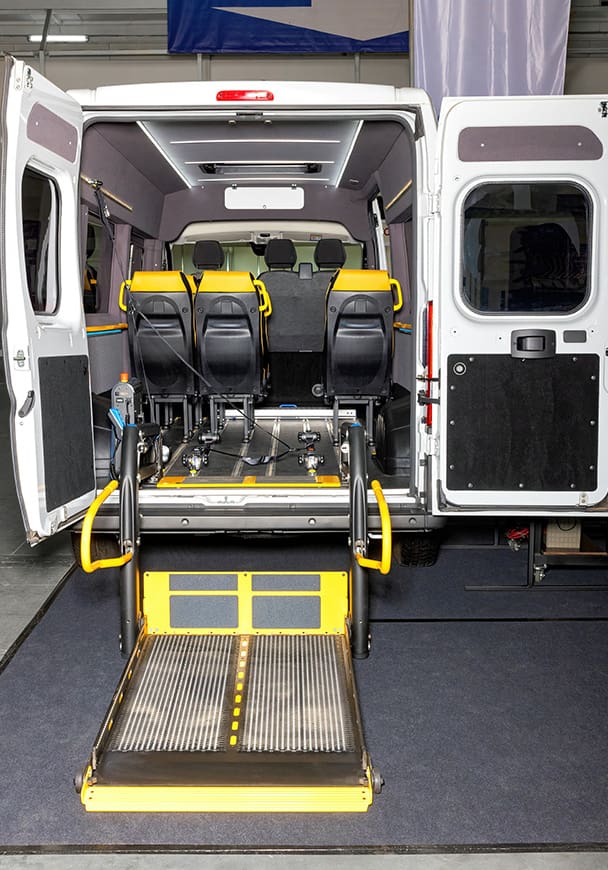 A van fitted with a deployable lift for handicapped people