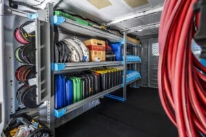 Inside of a van that has been upfitted with Adrian Steel products for an electrician.