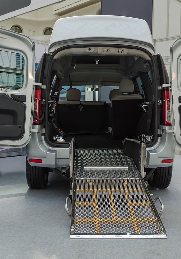 A van upfitted with a mobility ramp for handicapped individuals